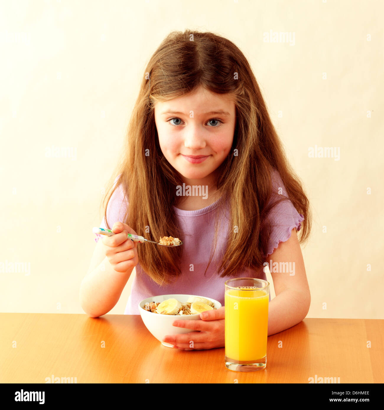 Girl eating muesli Stock Photo Alamy