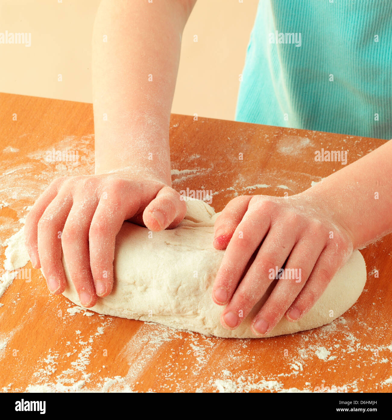 Girl kneading dough Stock Photo Alamy