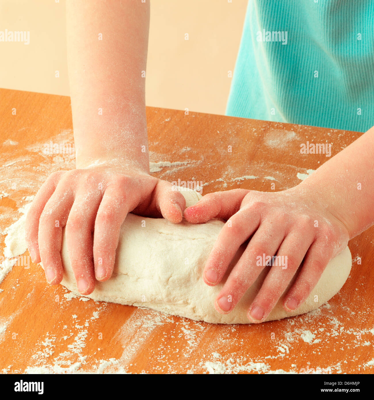 Girl kneading dough Stock Photo Alamy