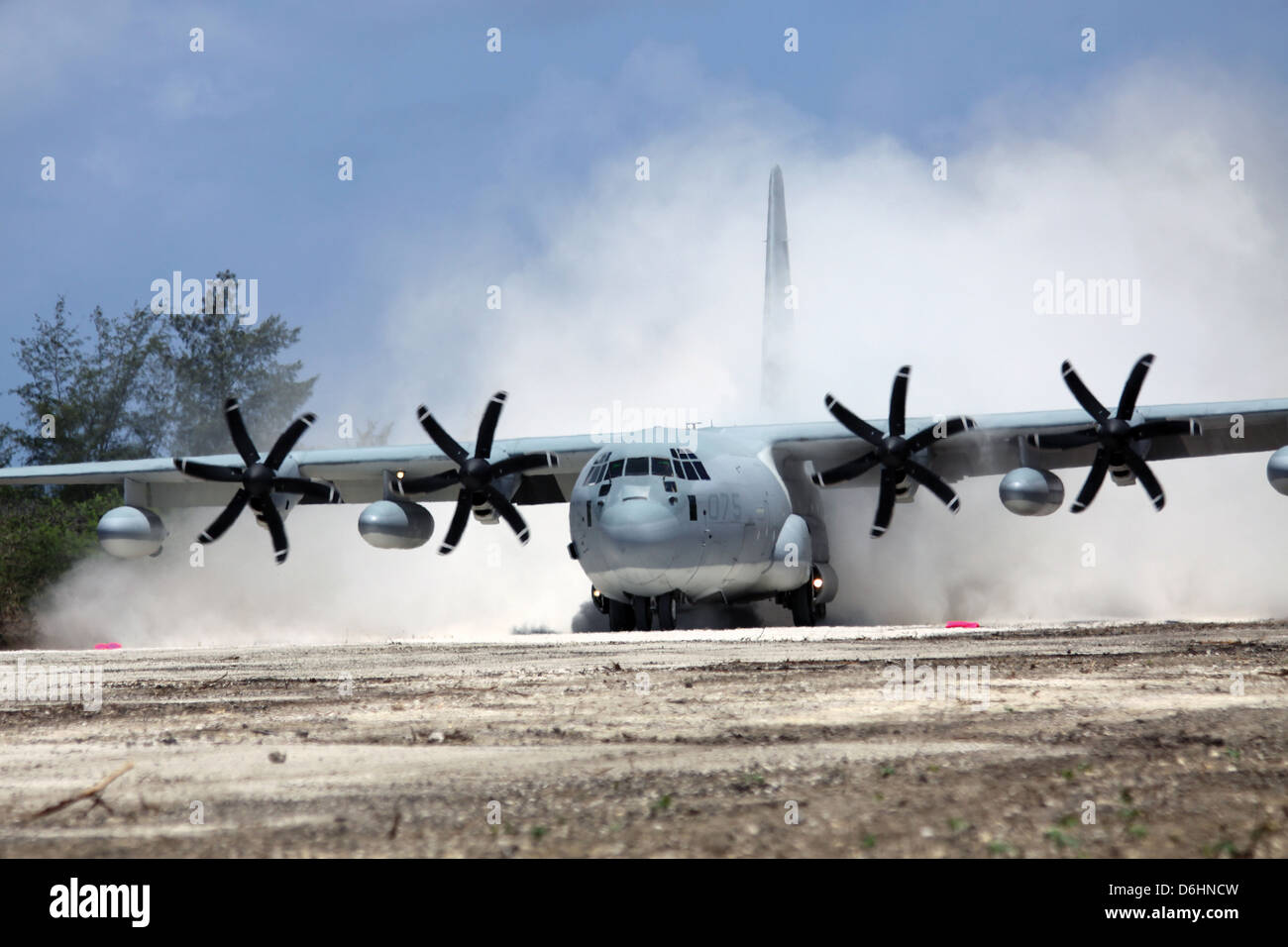 A USMC KC-130J Hercules aircraft lands on Tinian Island the first aircraft to land there since 1947 during Exercise Geiger Fury May 30, 2012 in Okinawa, Japan. Stock Photo