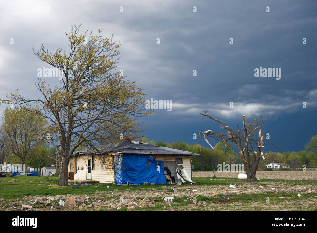Storm Clouds Over Home Damaged By March 2 2012 Tornado in Holton, Indiana Stock Photo