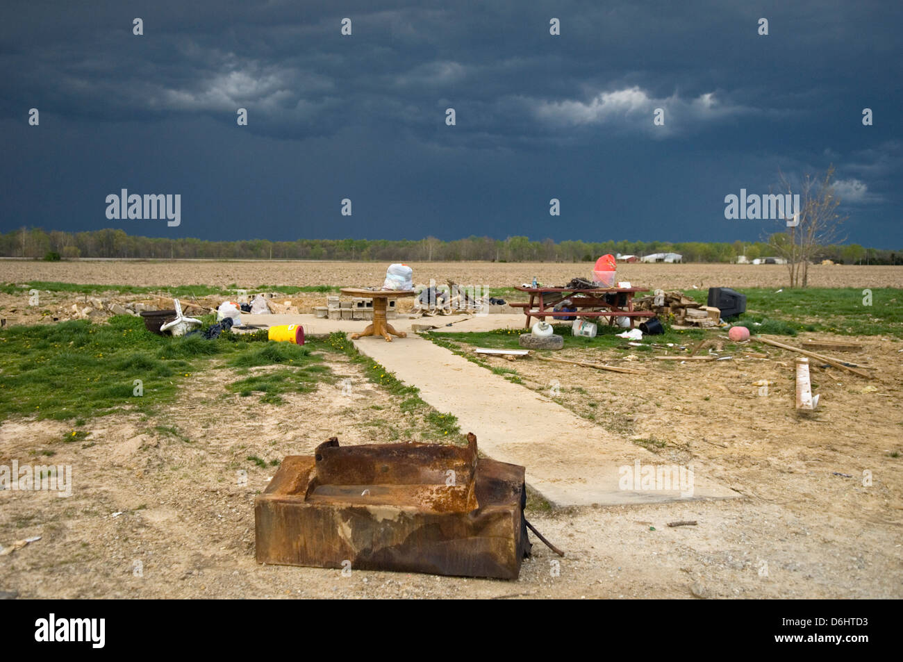 Concrete Pad and Debris where a House Once Stood before the March 2 2012 Tornado that Stuck in Holton, Indiana Stock Photo