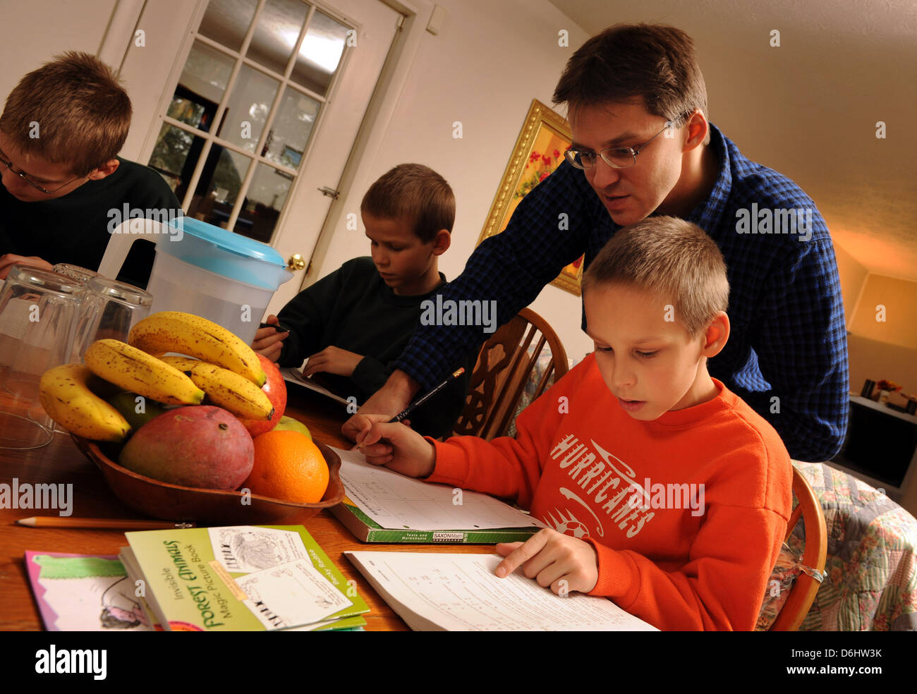 April 18, 2013 - A family homeschooling in rural Tennessee may be forced to return to their native Germany. Attorney General Eric Holder is disputing their case, arguing Germany's ban on homeschooling fails to violate the family's fundamental rights. The Romeikes fled Germany in 2008 after authorities fined them and took their children because they homeschooled them. PICTURED: Feb. 9, 2010.- Morristown, Tennessee, U.S. - UWE ROMEIKE teaches his children at home.  (Credit Image: © Robin Nelson/ZUMA Press) Stock Photo