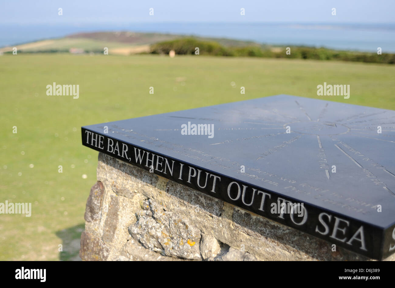 Memorial to Tennyson with a quote from his poem Crossing the Bar, Isle of Wight, Hampshire, UK Stock Photo