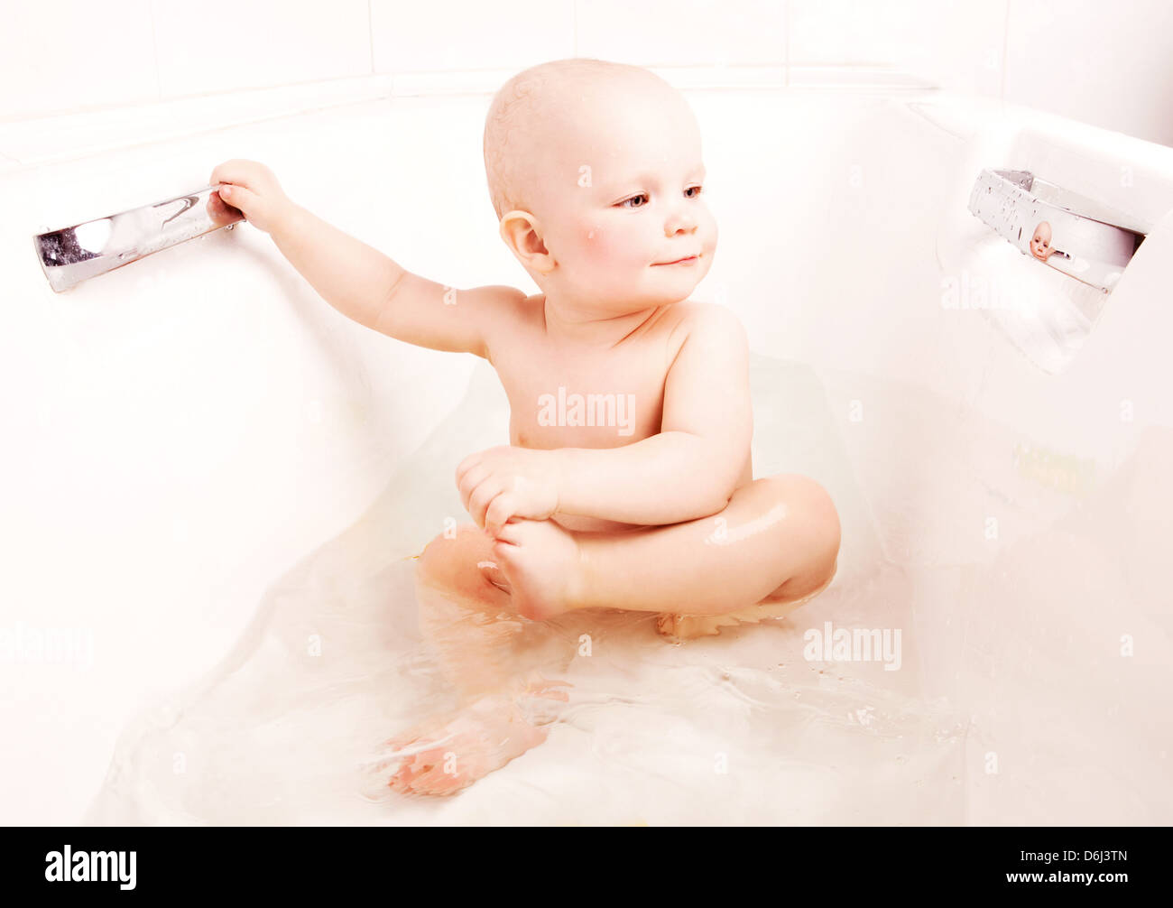 happy one year old baby taking a bath at home Stock Photo Alamy