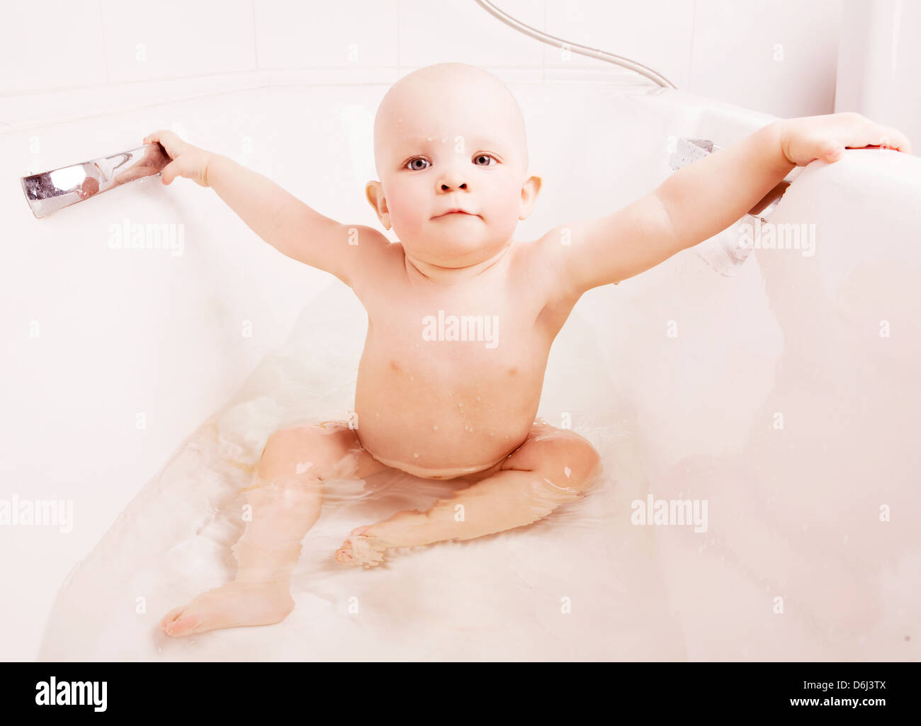 happy one year old baby taking a bath at home Stock Photo Alamy