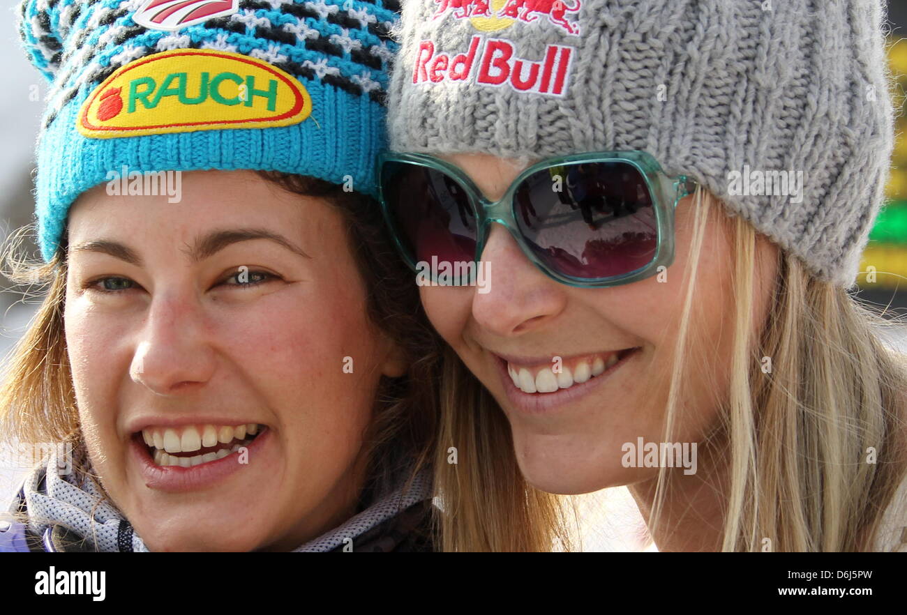 US skier Resi Stiegler (L) celebrates her second place with US skier Lindsey Vonn after the women's slalom event at the Alpine Skiing World Cup in Ofterschwang, Germany, 04 March 2012. Photo: STEPHAN JANSEN Stock Photo