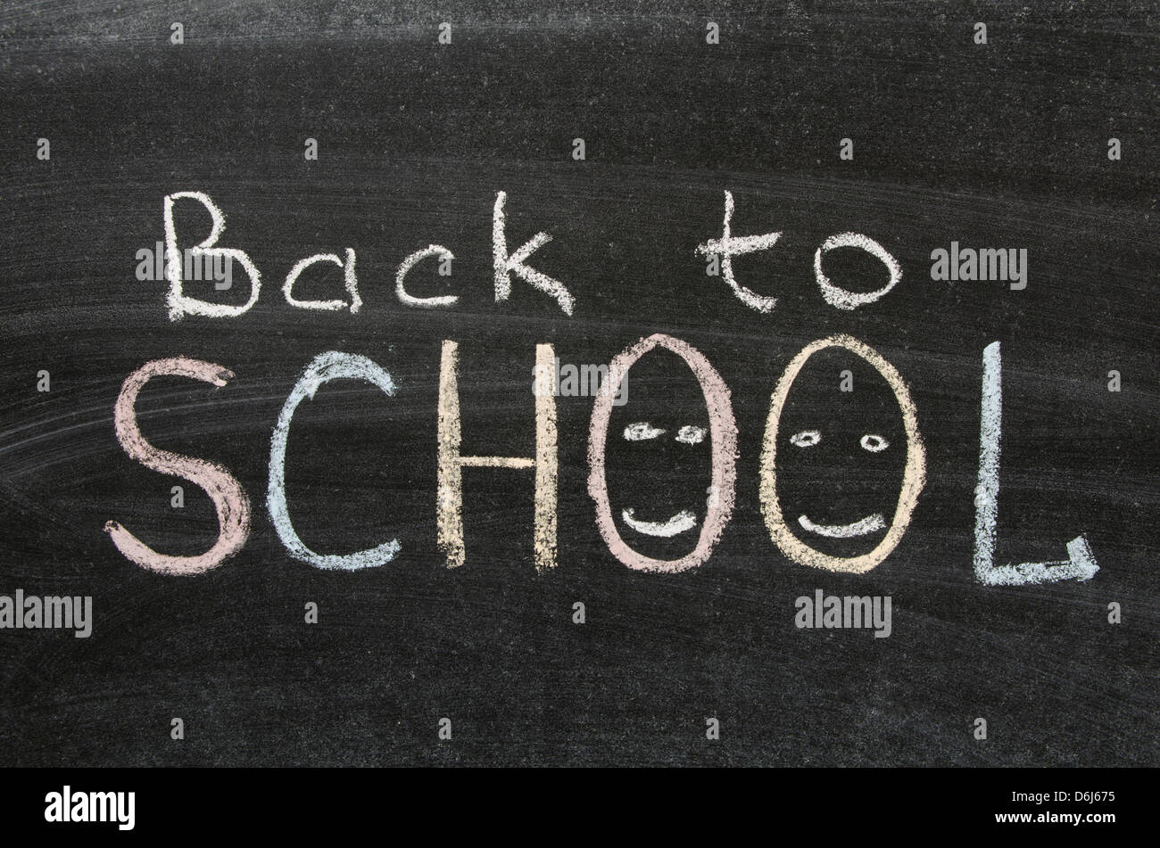 back to school phrase handwritten on blackboard Stock Photo