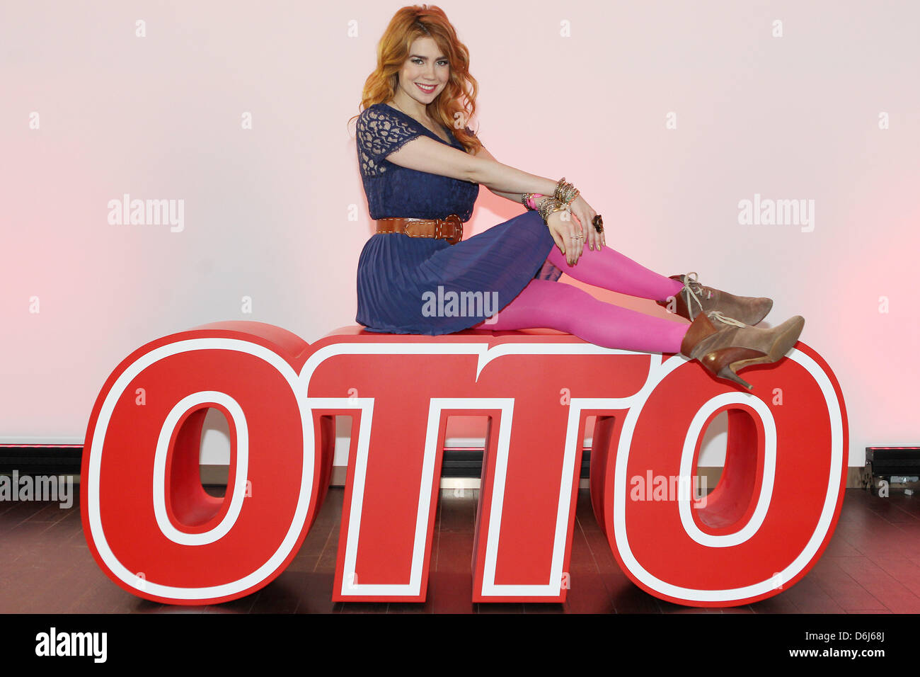 TV host and actress Palina Rojinski sits on top of the OTTO logo during ...