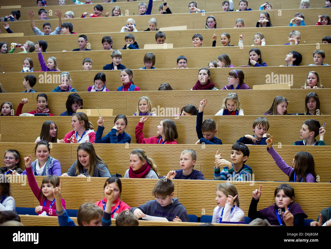 Children listen to the beginning lecture 'Stagecoaches, Railways and the Telegraph - The Internet of our Great Grandparents' at the 'Children's University' at the Viadrina European University in Frankfurt Oder, Germany, 07 March 2012. There are additional lectures every Wednesday until 28 March. The lectures are for children aged eight to 12. Photo: Patrick Pleul Stock Photo