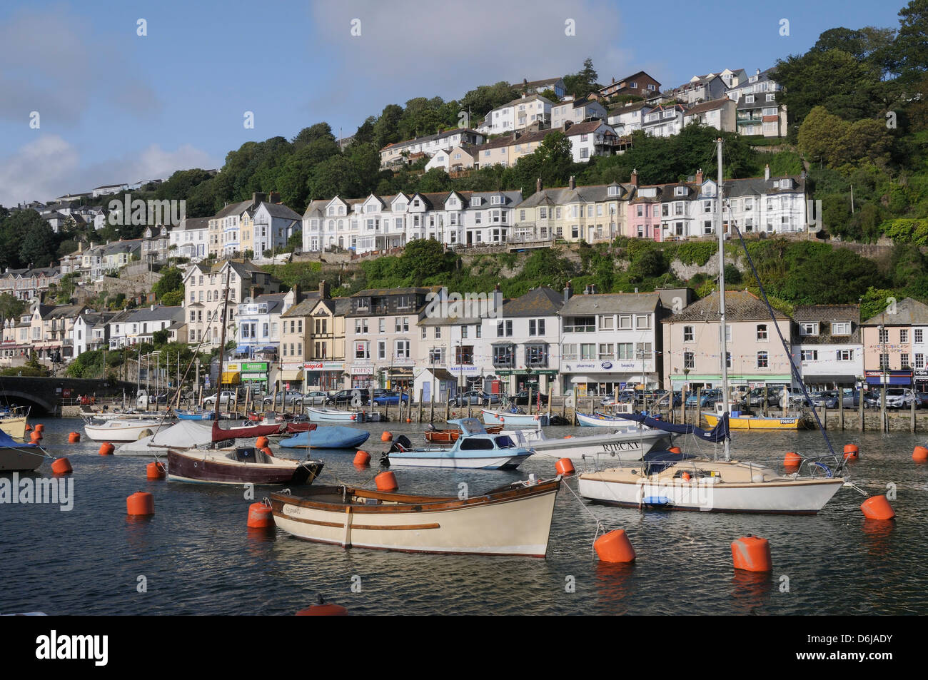 Fishing boats and sailing yachts moored in Looe harbour, Cornwall, England, United Kingdom, Europe Stock Photo