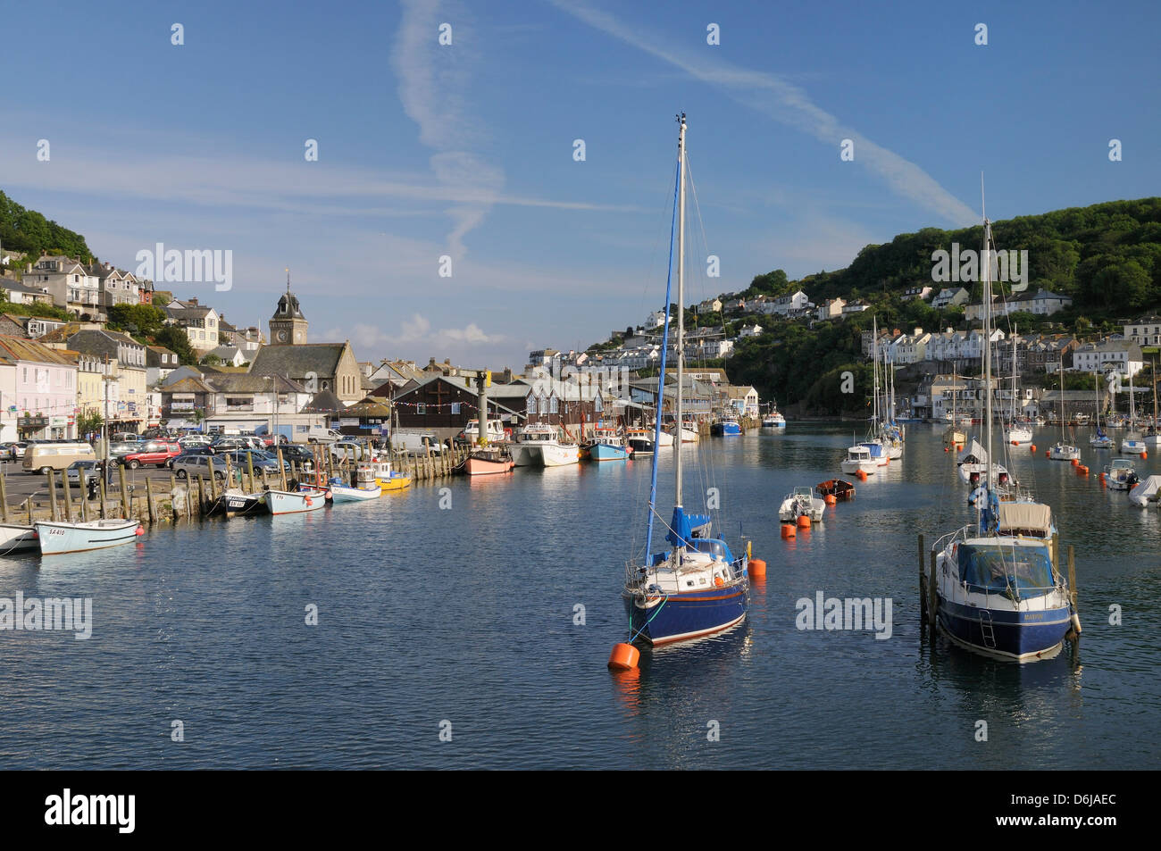 Sailing yachts and fishing boats moored in Looe harbour, Cornwall, England, United Kingdom, Europe Stock Photo