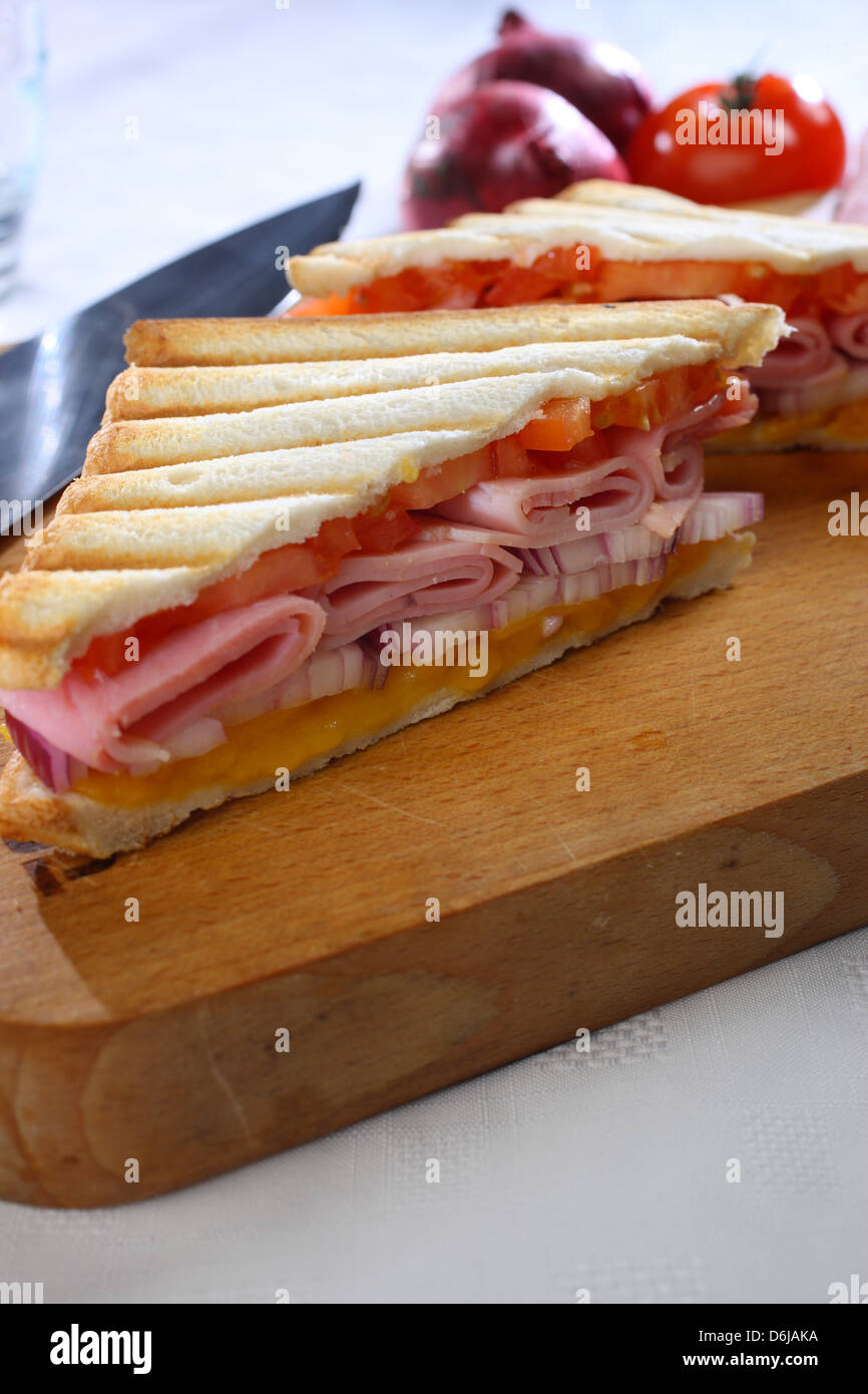 Ham cheese tomato and red onion sandwich Stock Photo Alamy