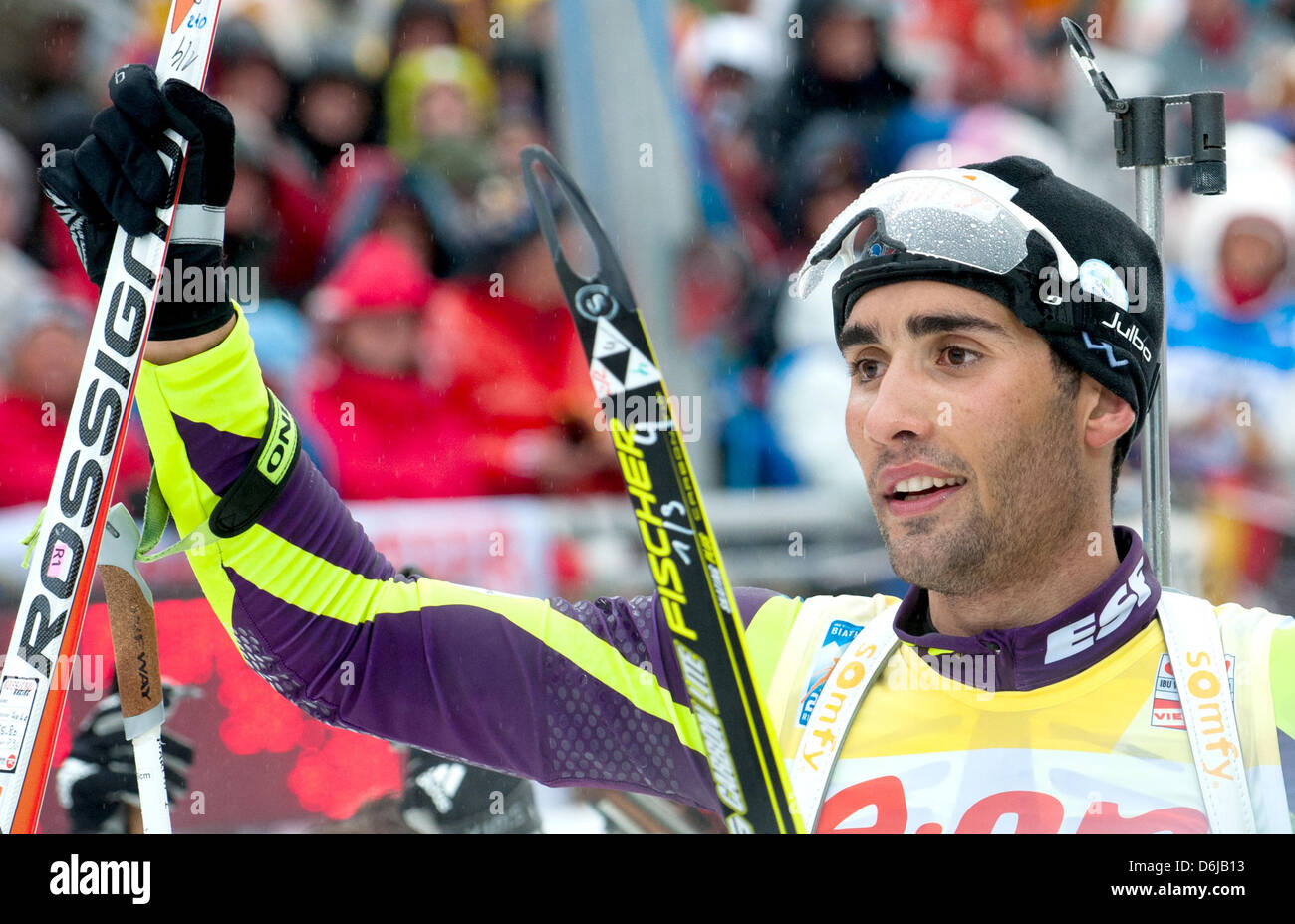 French biathlete Martin Fourcade cheers at the finishing line of the men's  15km mass start competition of the 2012 Biathlon World Championships at  Chiemgau Arena in Ruhpolding, Germany, 11 March 2012. Fourcade