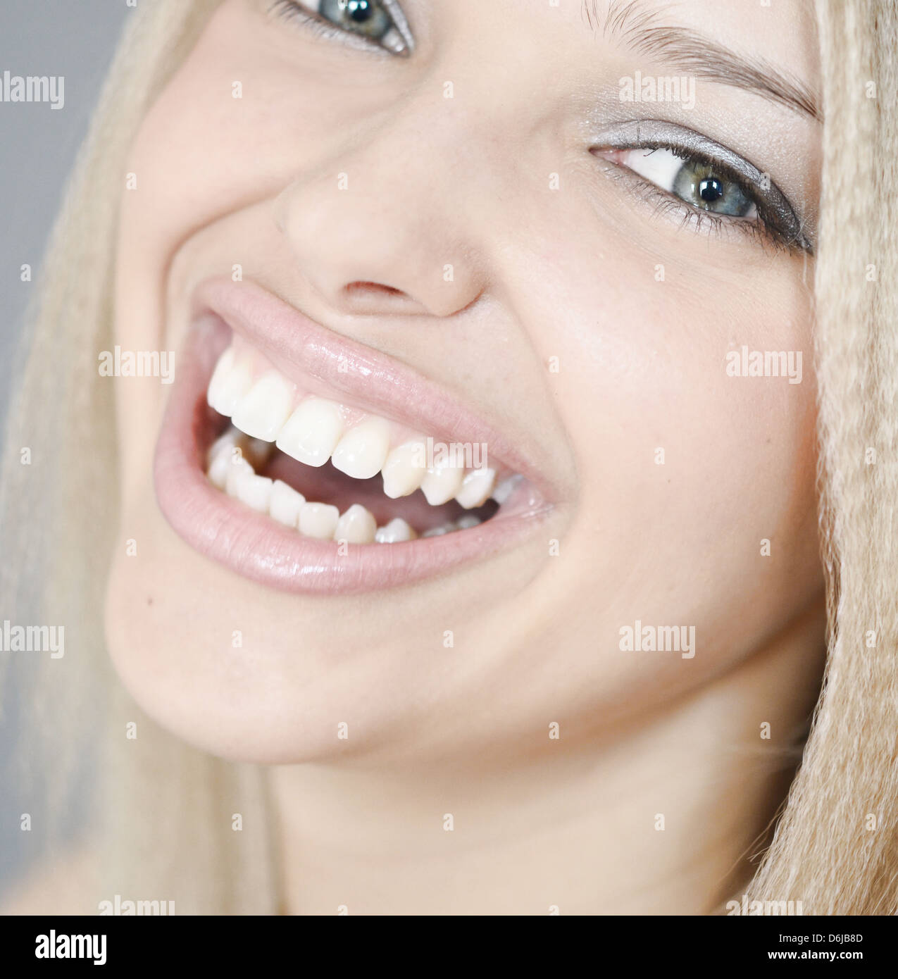 portrait of a young happy smiling woman Stock Photo - Alamy