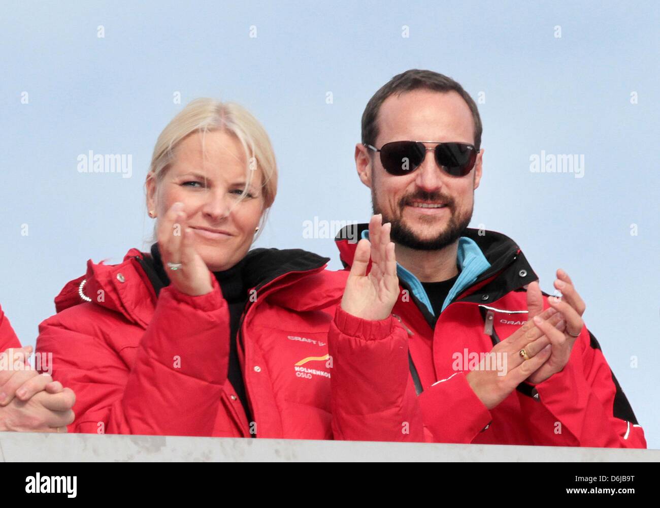 Crown Princess Mette-Marit and Crown Prince Haakon of Norway visit the ski jumping FIS World Cup at the Holmenkollen in Oslo, Norway, 11 March 2012. Photo: Albert Nieboer / NETHERLANDS OUT Stock Photo
