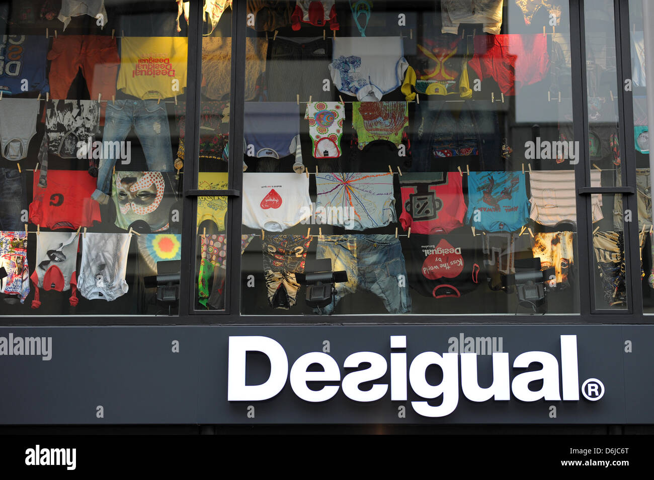 A store of the Spanish fashion label "Desigual" is decorated with many  colorful t-shirts, shirts and trousers in Nuremberg, Germany, 13 March  2012. Desigual, the Spanish word for "unequal" or different, is