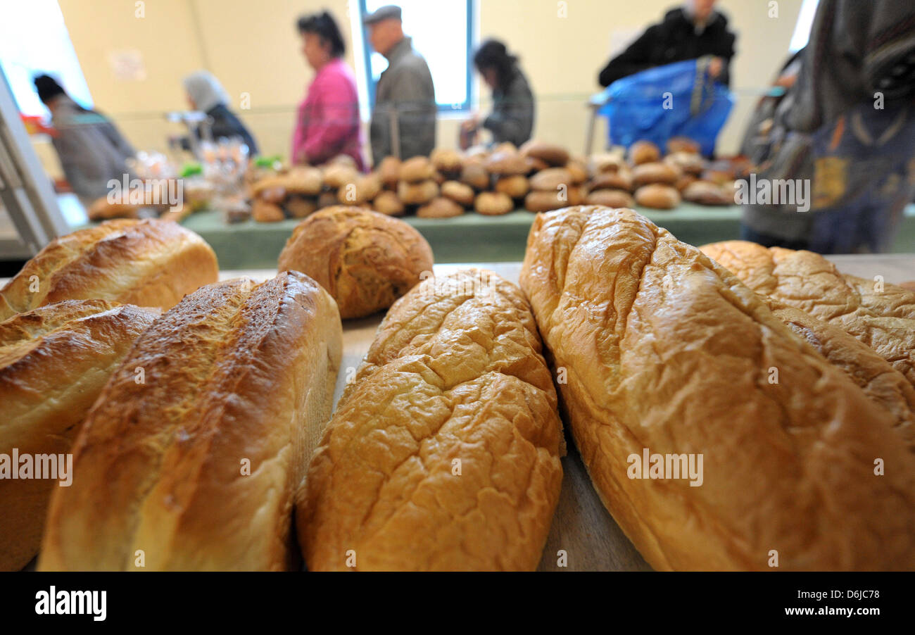 Bread sits on a table ready to be handed out to the needy in the background  at "Bremer Tafel" in Bremen, Germany, 13 March 2012. According to a study,  each German throws