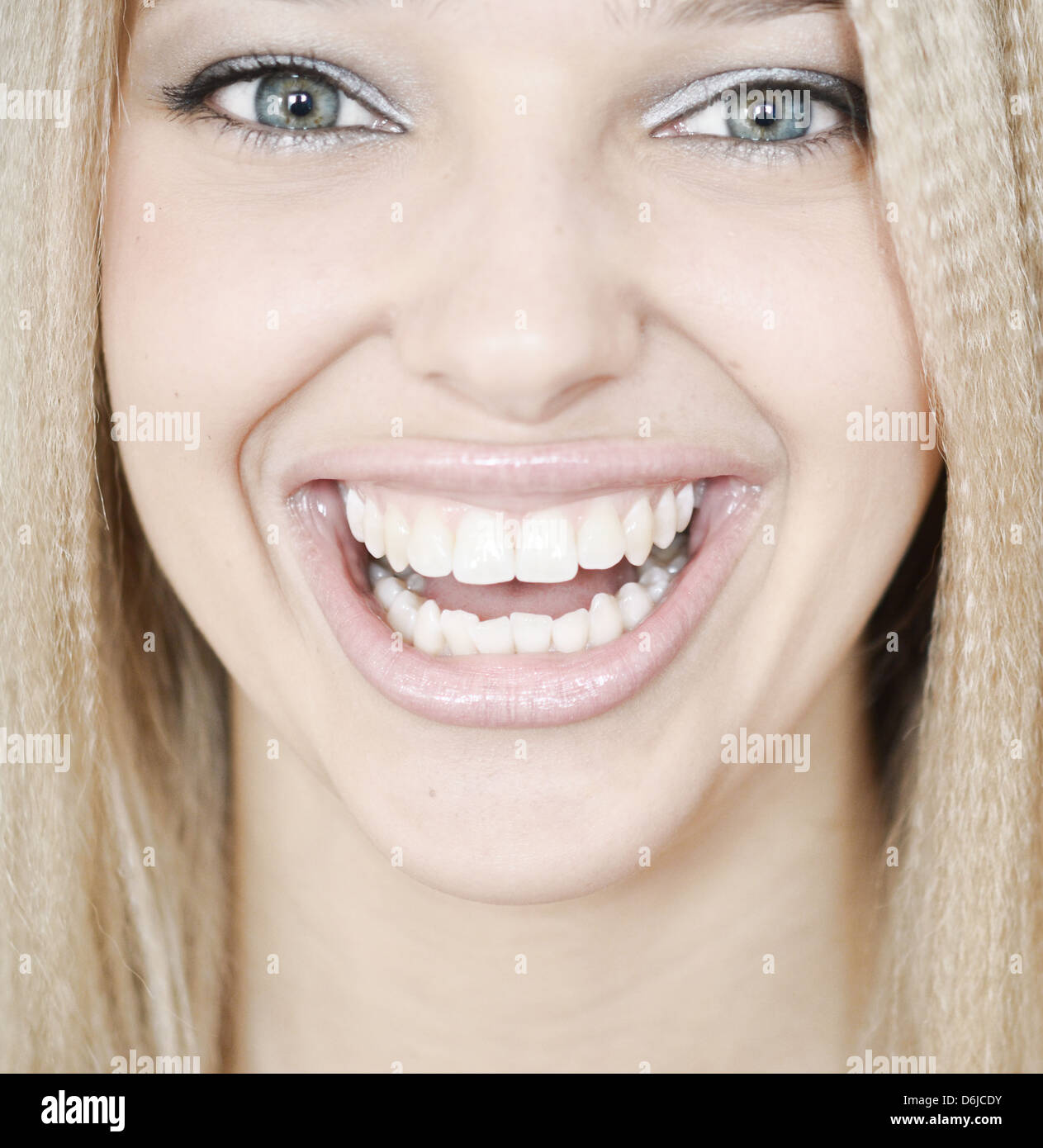 portrait of a young happy smiling woman Stock Photo - Alamy