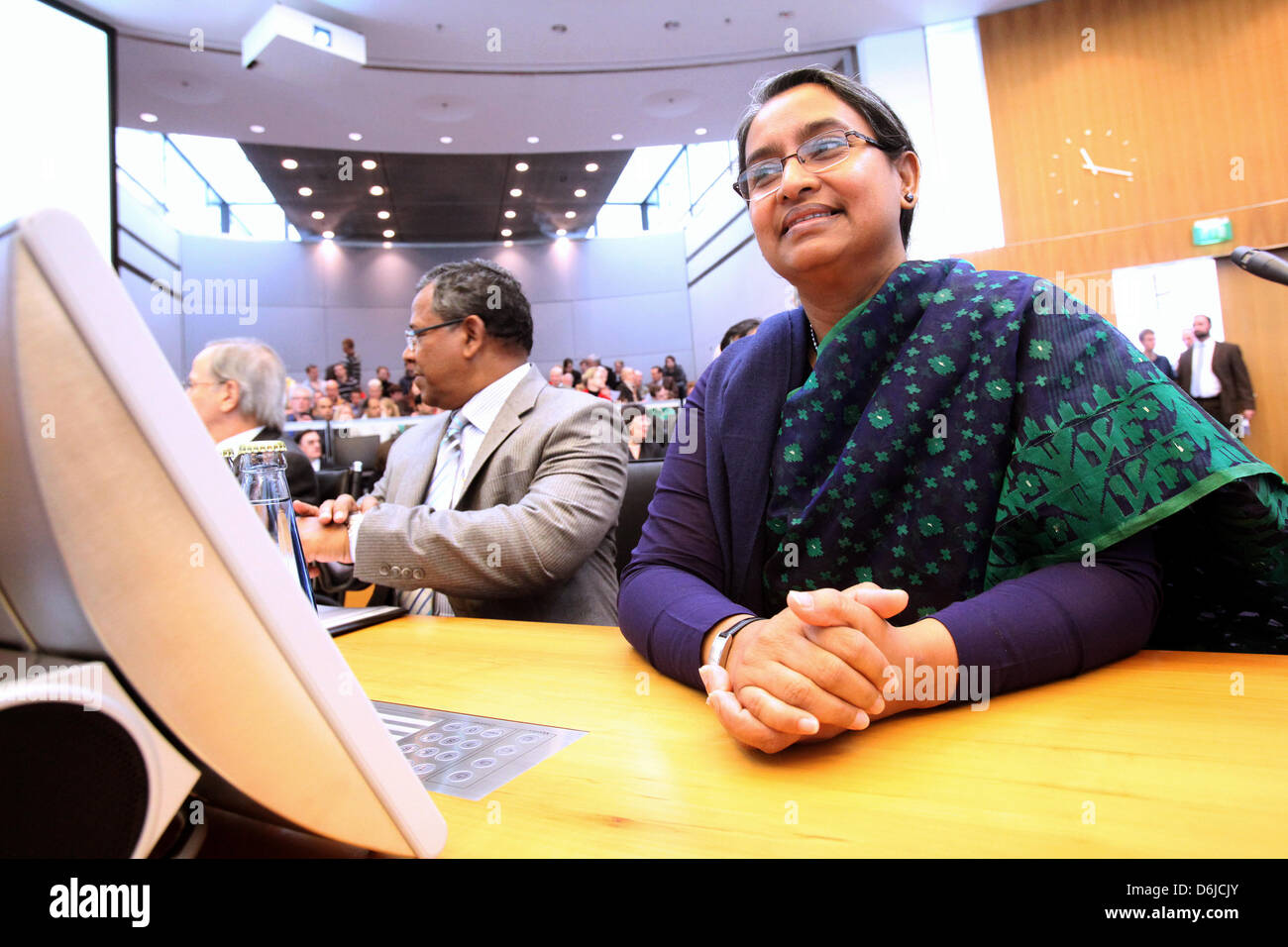 Bangladeshi Foreign Minister Dipu Moni (R) is pictured before the announcement of the verdict in a legal dispute between Burma and Bangladesh at the International Tribunal for the Law of the Sea (ITLOS) in Hamburg, Germany, 14 March 2012. The court had to settle a dispute over a maritime boundary between Burma and Bangladesh. Photo: BODO MARKS Stock Photo