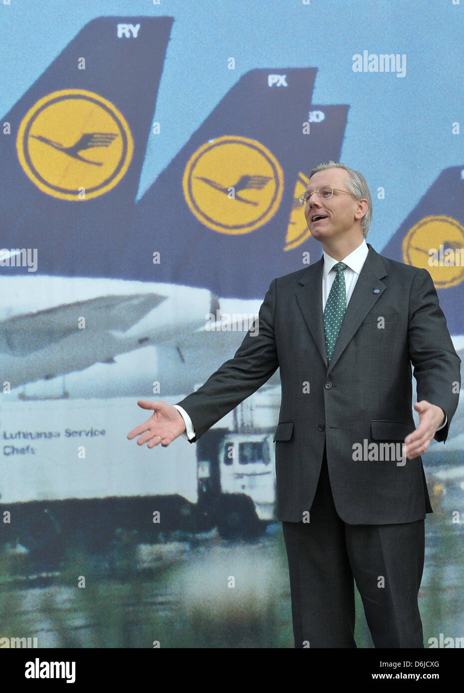 Lufthansa AG CEO, Christoph Franz, stands in front of a photo wall showing Lufthansa aircrafts during the Lufthansa financial statement press conference in Frankfurt/Main, Germany, 15 March 2012. Photo: BORIS ROESSLER Stock Photo