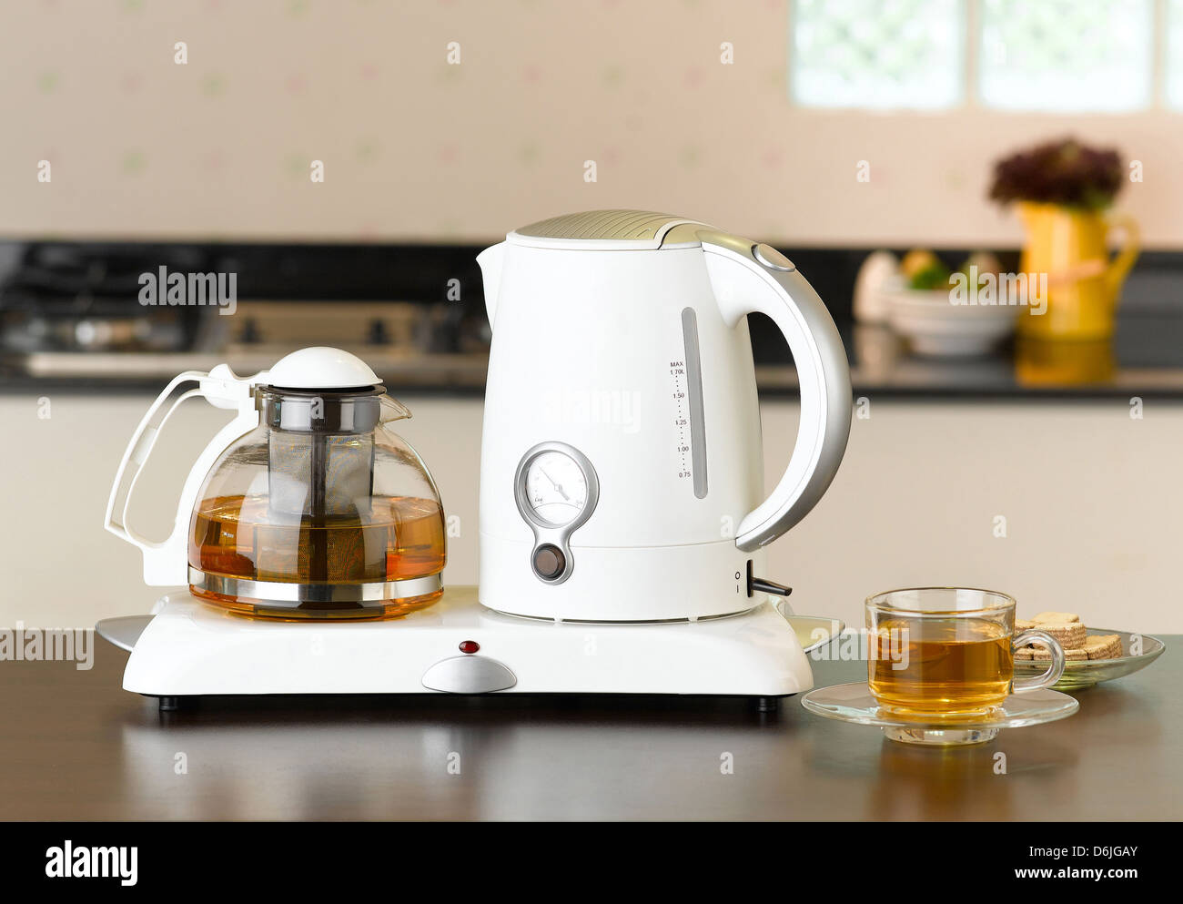 Electric kettle and glass pot for tea time or coffee time Stock Photo