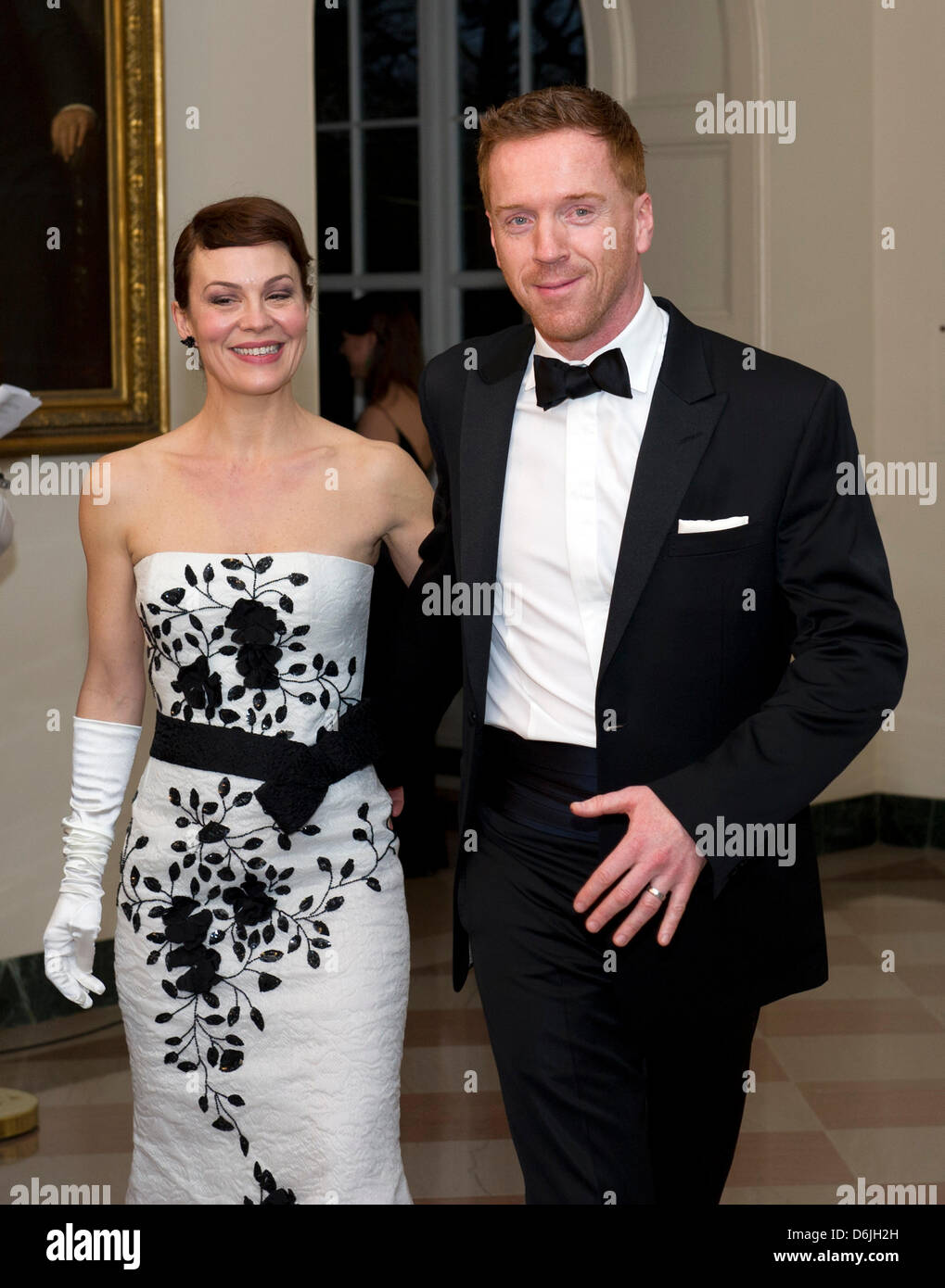 Damian Lewis and Helen McCrory arrive for the Official Dinner in honor of Prime Minister David Cameron of Great Britain and his wife, Samantha, at the White House in Washington, D.C., USA, 14 March 2012. Photo: Ron Sachs / CNP.(RESTRICTION: NO New York or New Jersey Newspapers or newspapers within a 75 mile radius of New York City) Stock Photo