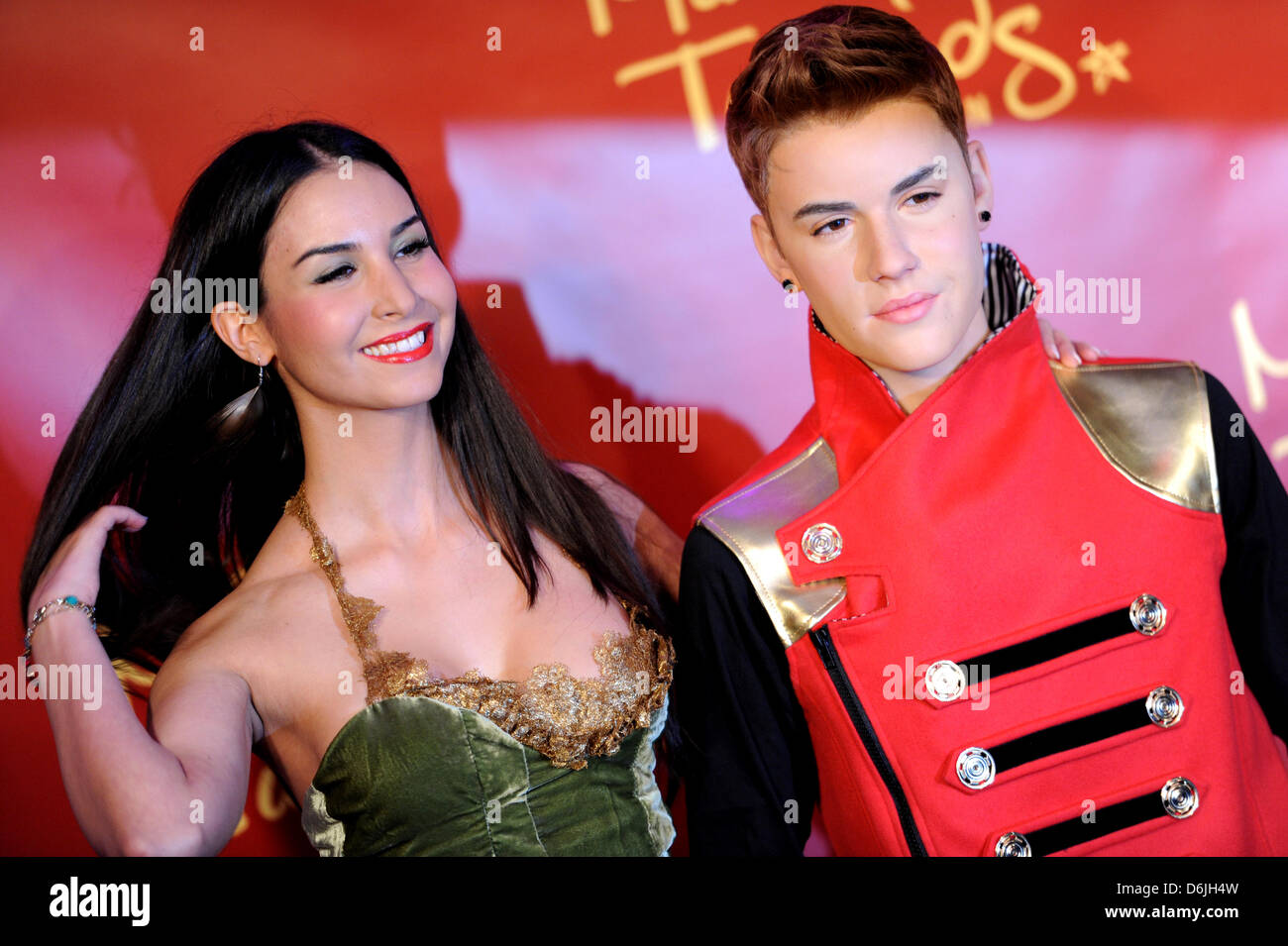 Actress Sila Sahin presents the wax statue of Canadian singer Justin Bieber in Madame Tussauds in Berlin, Germany, 19 March 2012. Photo: RAINER JENSEN Stock Photo