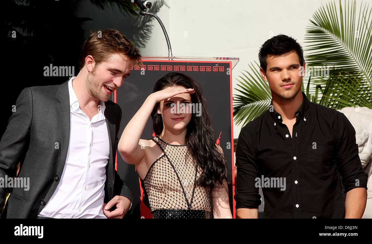 Robert Pattinson, Kristen Stewart , Taylor Lautner Stars of 'The Twilight Saga' films are honoured with a Hand and Footprint Stock Photo