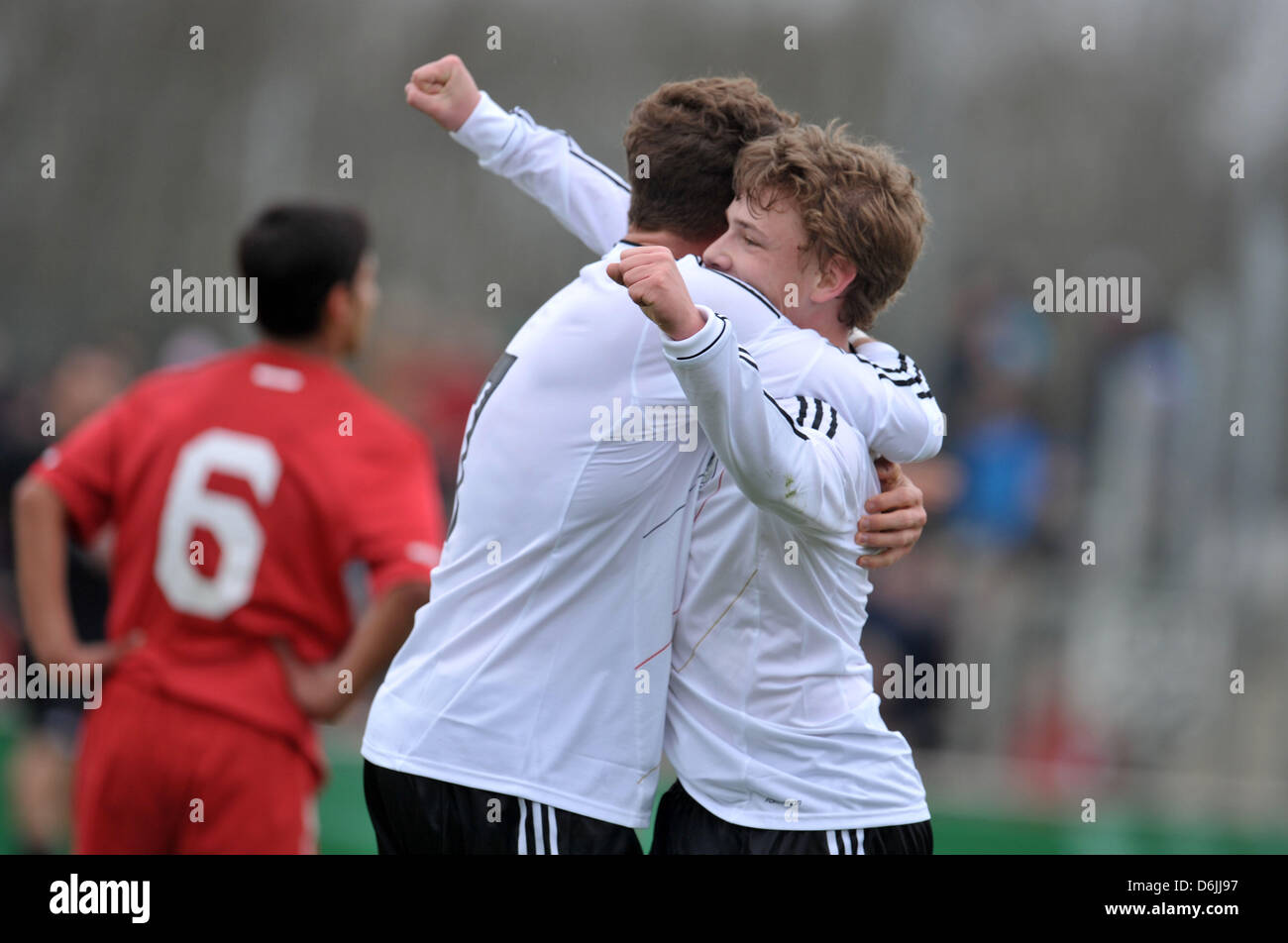 Germany's Maximilian Dittgen (L) celebrates his 2-0 goal with Max Meyer, who scored the 1-0 goal, during the European U-17 Football Championship elite round qualification match between Germany and Turkey at Sportpark Vinnenweg in Bremen, Germany, 20 March 2012. Photo: CARMEN JASPERSEN Stock Photo