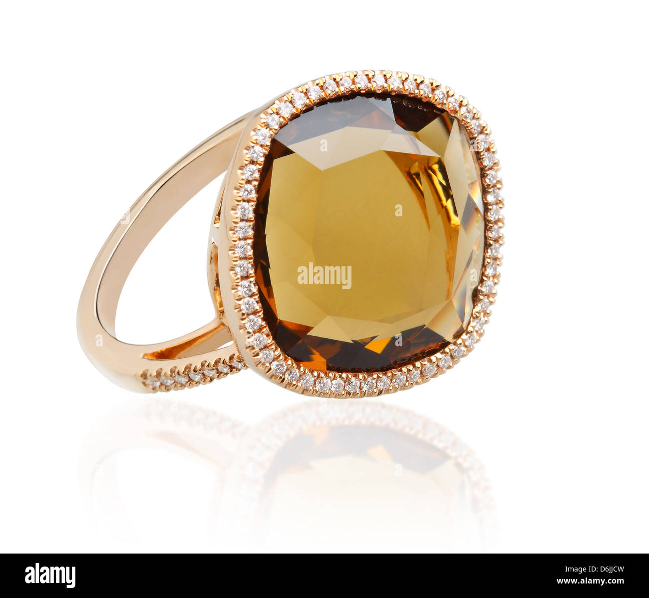 Luxury topaz ring surrounded by shiny diamonds Stock Photo