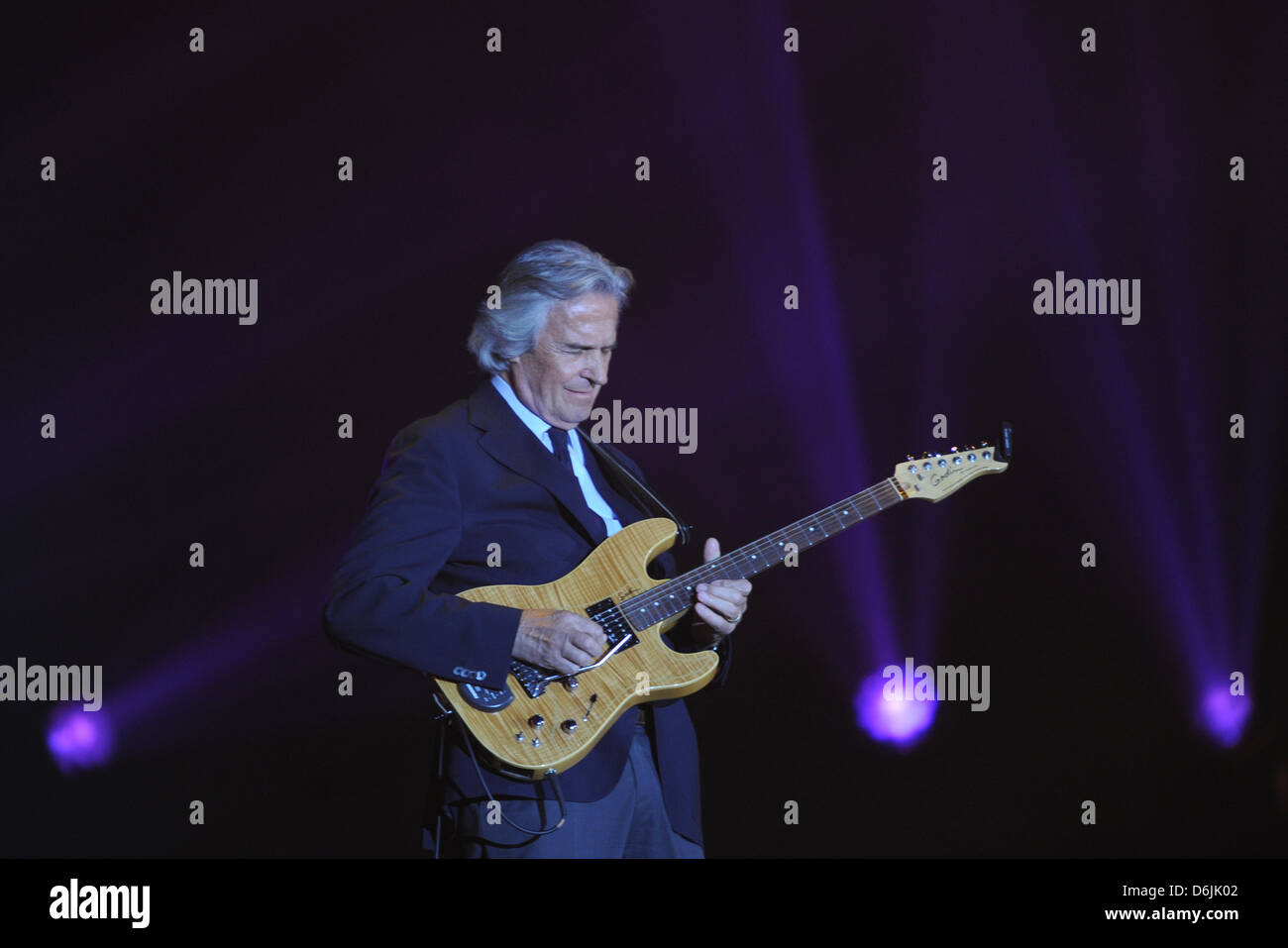 Musician John McLaughlin performs at the opening gala of the music trade show at the Festhalle Frankfurt in Frankfurt Main, Germany, 20 March 2012. The guitarist received the Frankfurt Music Prize. The Live Entertainment Award was presented during the gala, an award which honors the people behind the scenes of the entertainment industry. Photo: Arne Dedert Stock Photo