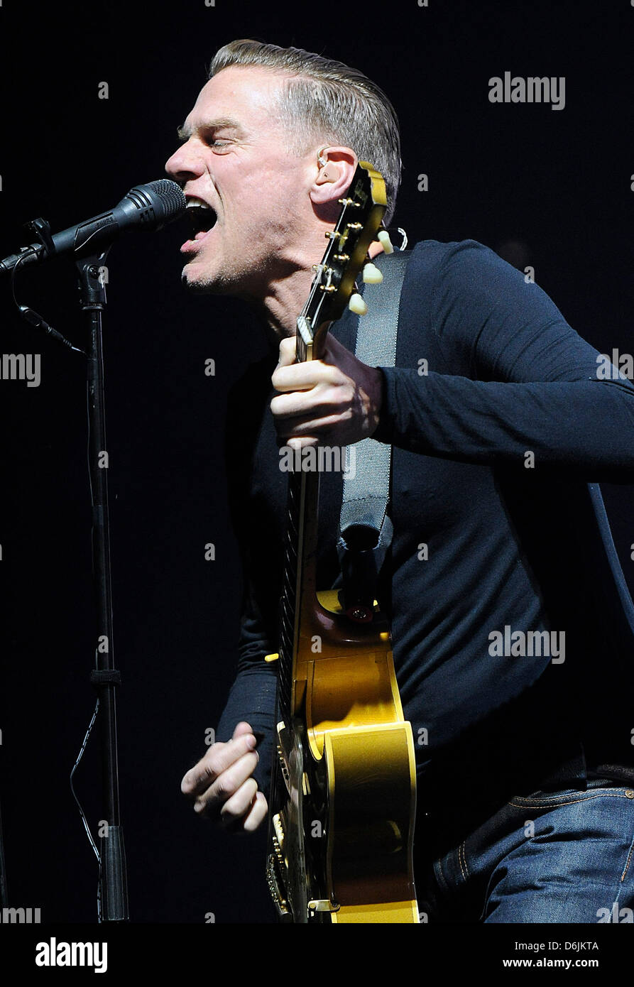 Bryan Adams performs on stage during a concert in Cologne, Germany, 21 ...
