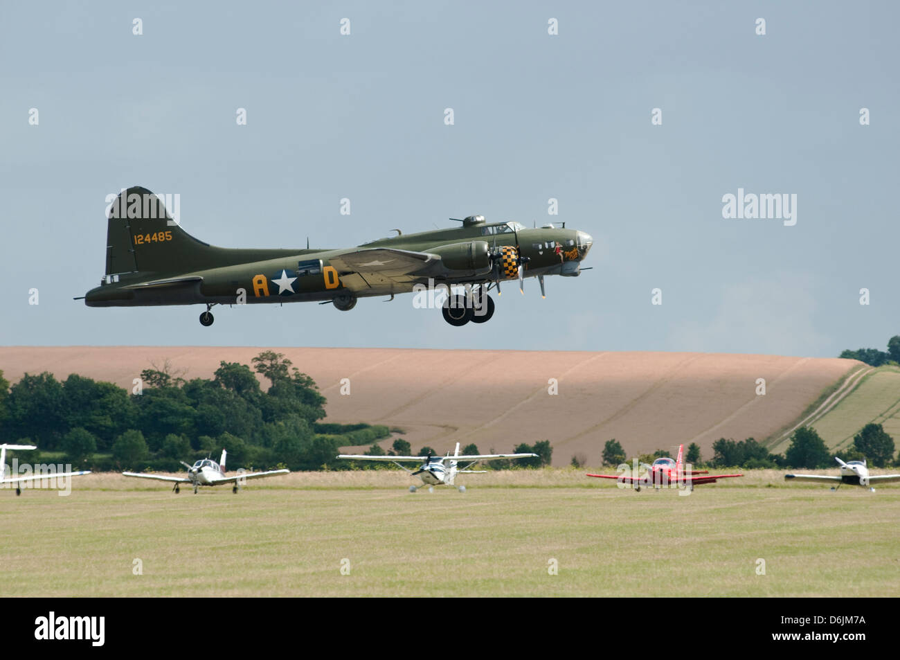 A World war two USAF B17 aircraft seen 'taking off' from an airfield. Stock Photo