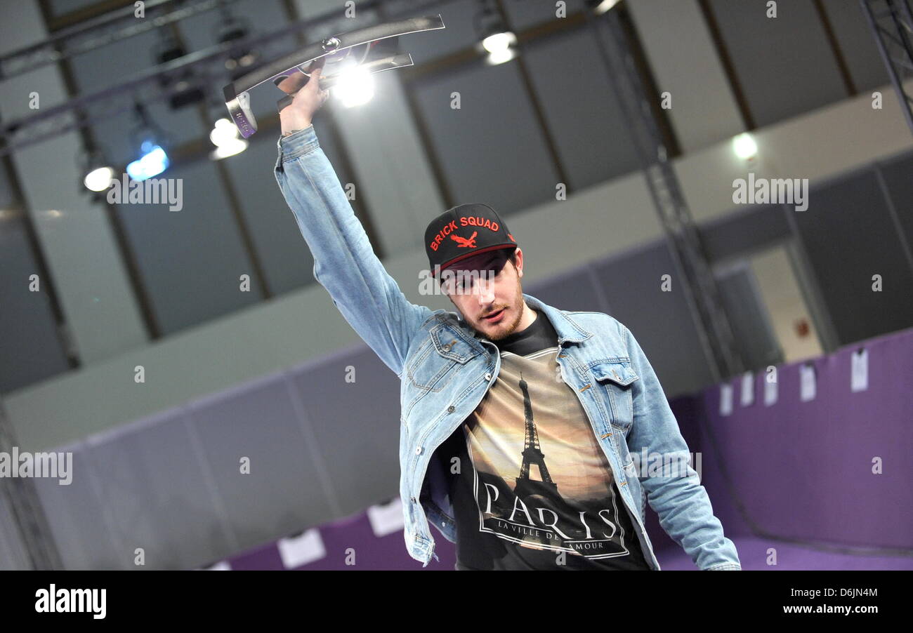 German singer Casper poses with the 2012 Echo Music Award in the category  'Hip-Hop/Urban National /International' in the press room after the Echo  Awards ceremony in Berlin, Germany, 22 March 2012. The