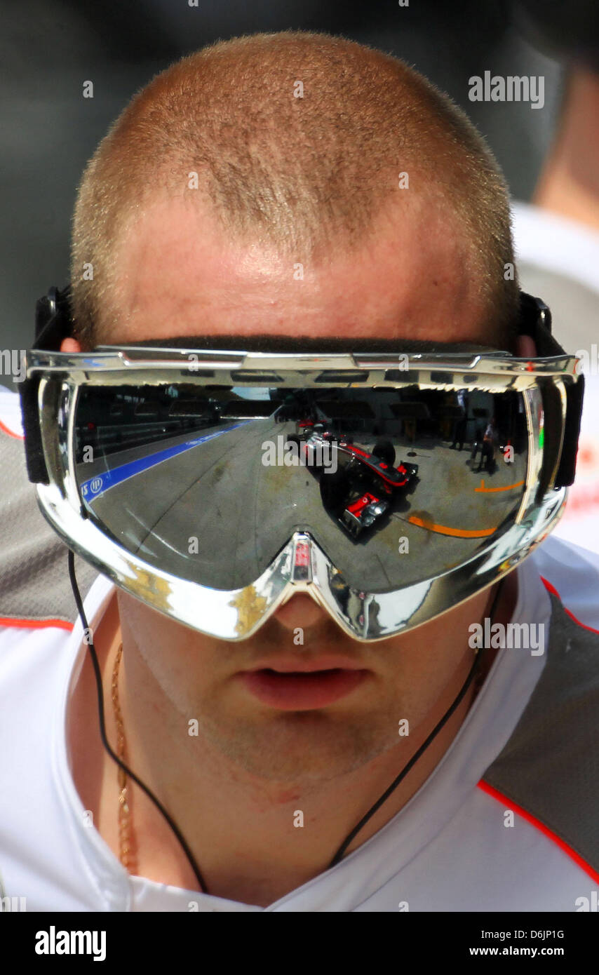 The car of British Formula One driver Hamilton of McLaren Mercedes is reflected in the