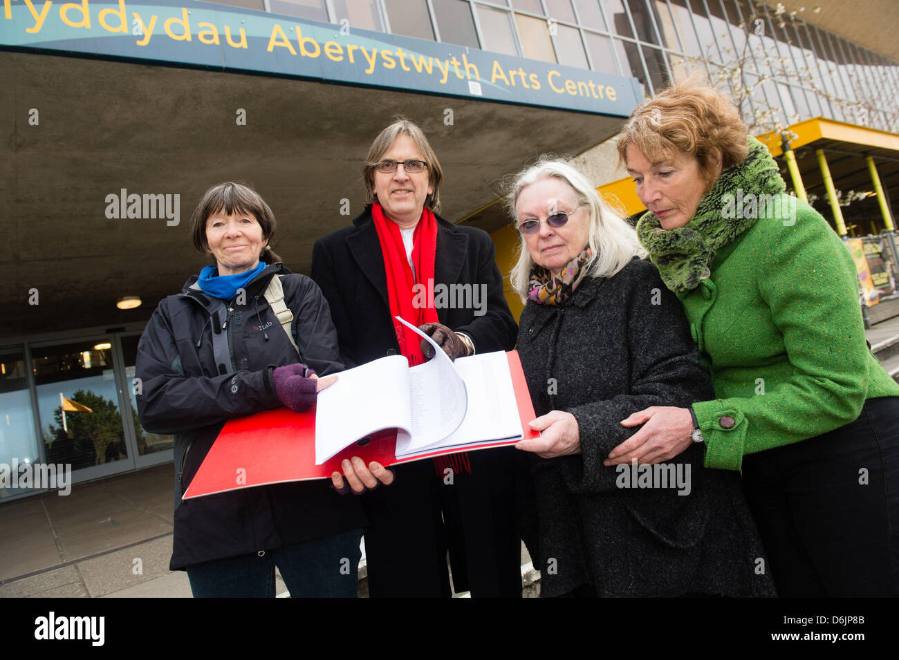 Aberystwyth, Wales, UK. April 19 2013.  L-R: LYNNE DICKENS, STEPHEN WEST, GILLIAN CLARKE, JANE LLOYD-FRANCIS}  Protesters unhappy with the suspension of two Aberystwyth Arts Centre's senior managers, present a petition signed by over 1,700 people to APRIL McMAHON, Principal of Aberystywyth University.  Local artists and other concerned members of the public fear that planned re-organisation within the University will lead to less public access to the internationally renowned centre  photo Credit: Keith Morris/Alamy Live News Stock Photo