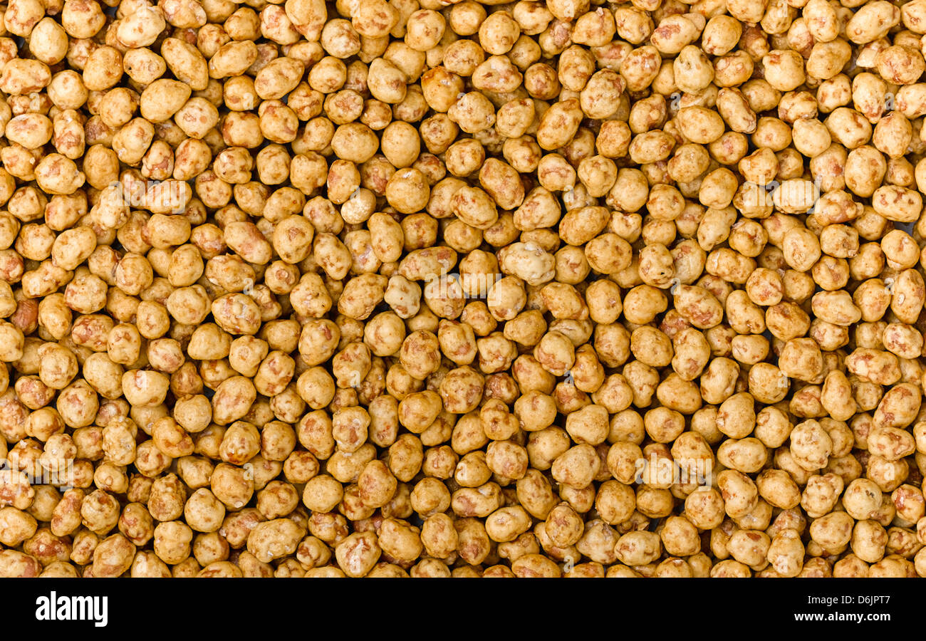 Peanuts coated by coconut milk and soy sauce Stock Photo Alamy