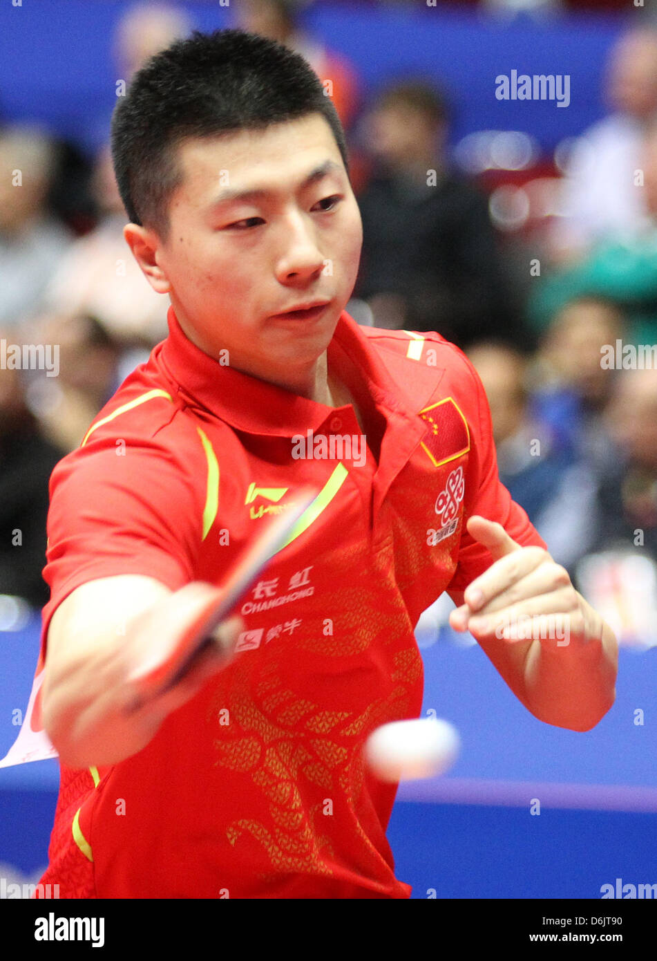 Chinese Long Ma serves against Greek Gionis during the man's World Table Tennis Championships group A match between China and Greece at the Westfalenhalle in Dortmund, Germany, 25 March 2012. Photo: FRISO GENTSCH Stock Photo