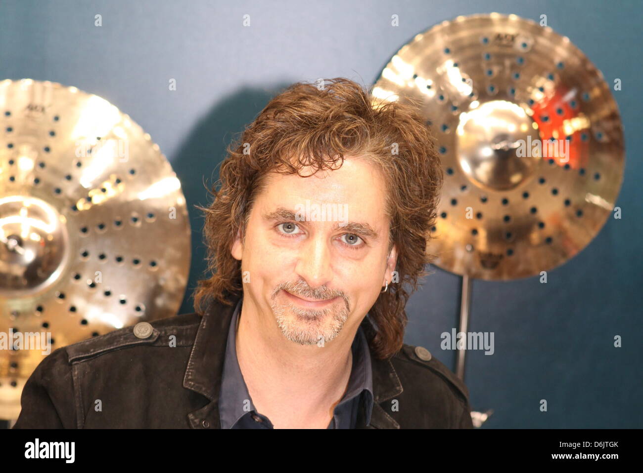 Todd Sucherman, drummer of the US band Styx, signs autographs during the Music Fair in Frankfurt/Main, Germany, 24 March 2012.  Photo: Susannah V. Vergau Stock Photo