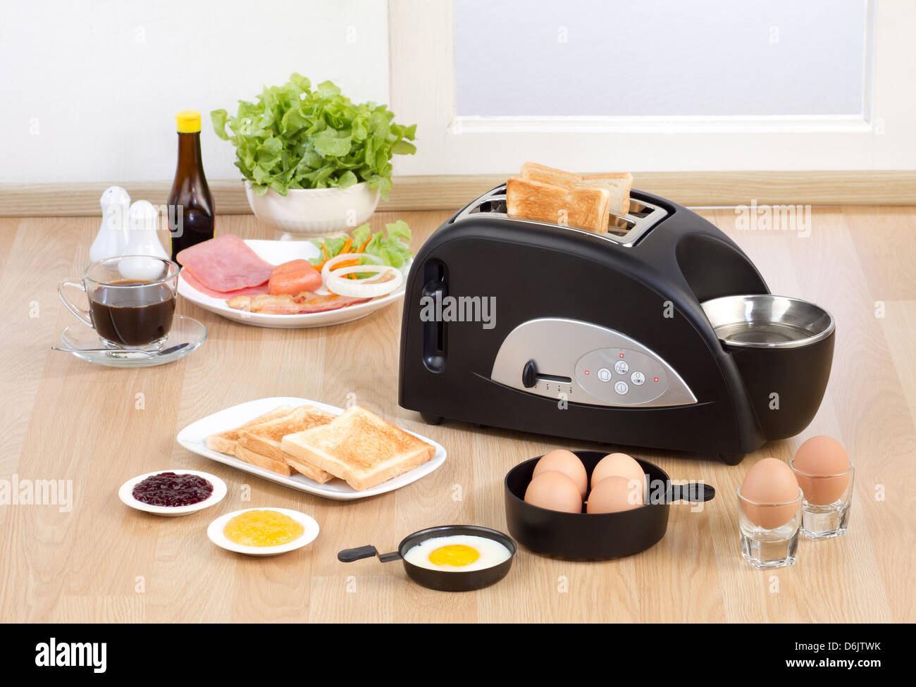 https://c8.alamy.com/comp/D6JTWK/multi-purpose-bread-toaster-it-has-function-for-boiling-and-frying-D6JTWK.jpg