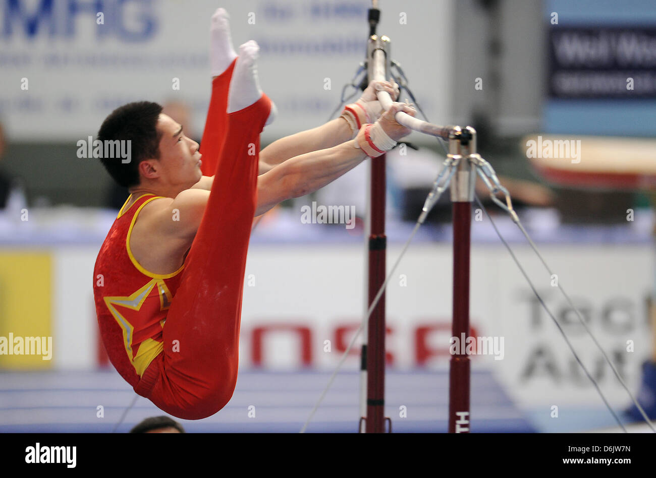 Chinese gymnast Zhou Shixiong performs on the high bar during the world