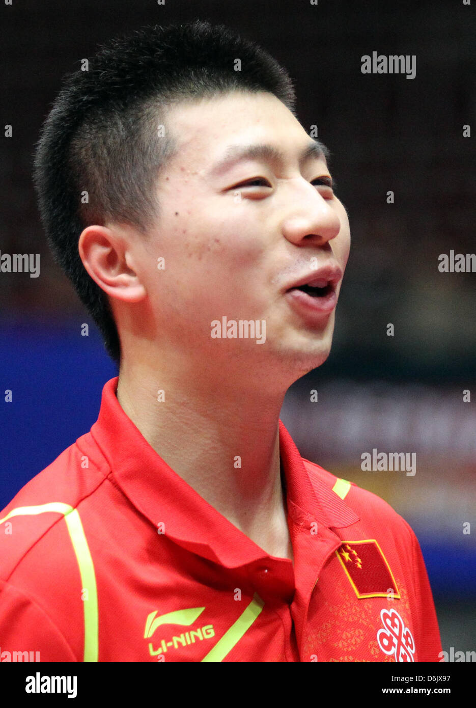 China's Long Ma smiles after winning the men's group A match against Slovenia's Lasan at the 2012 World Team Table Tennis Championships at Westfalenhalle in Dortmund, Germany, 28 March 2012. Photo: Friso Gentsch Stock Photo