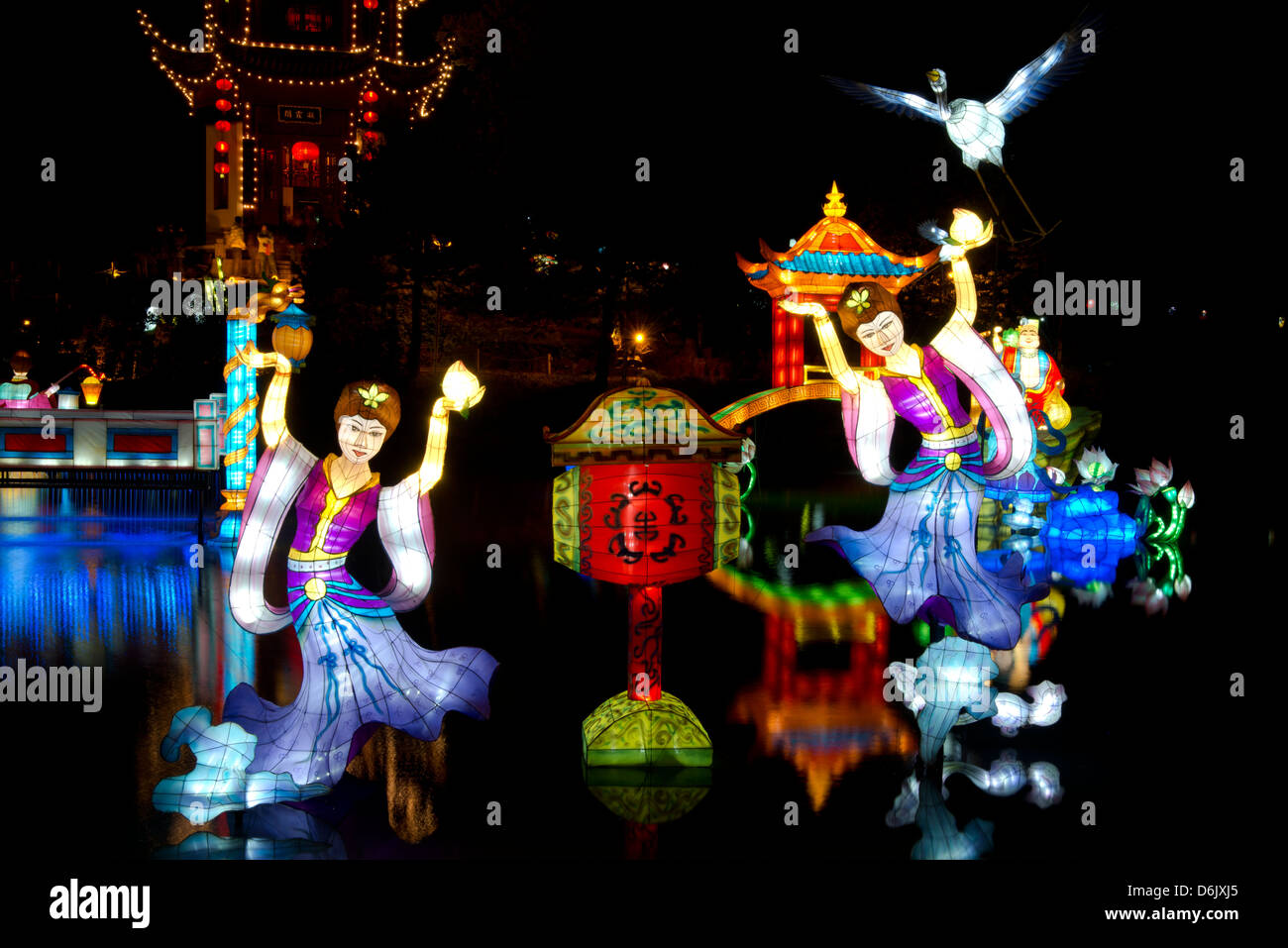 Chinese lanterns reflected on a lake during at the Montreal Botanical