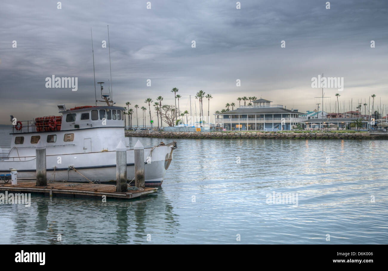 HDR landscape of commercial fishing boat at Alamitos Bay in Long Beach, California Stock Photo