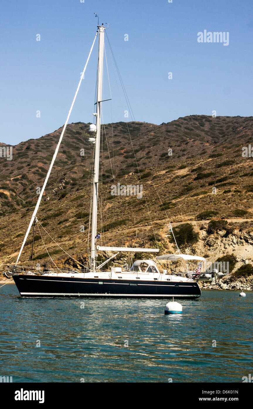 Sailboat moored at Santa Catalina Island in the quiet bay of Catalina Harbor Stock Photo