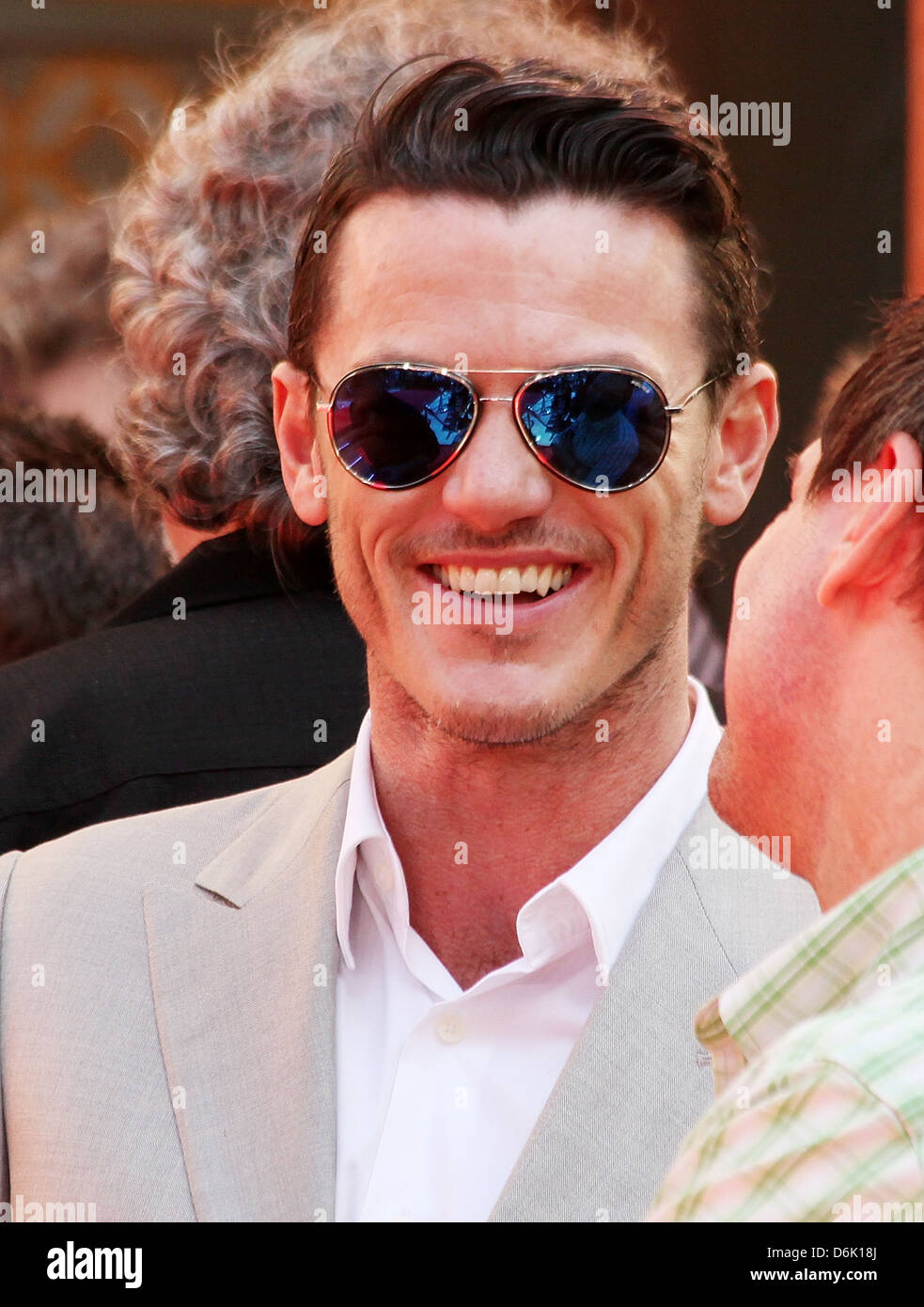 Luke Evans at the Hand and Footprint Ceremony outside Grauman's Chinese