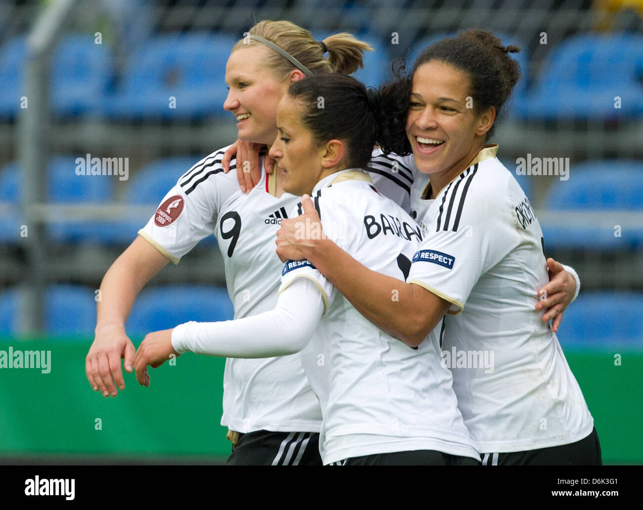 Germany's Alexandra Popp, Fatmire Bajramaj and Celia Okoyino da Mbabi