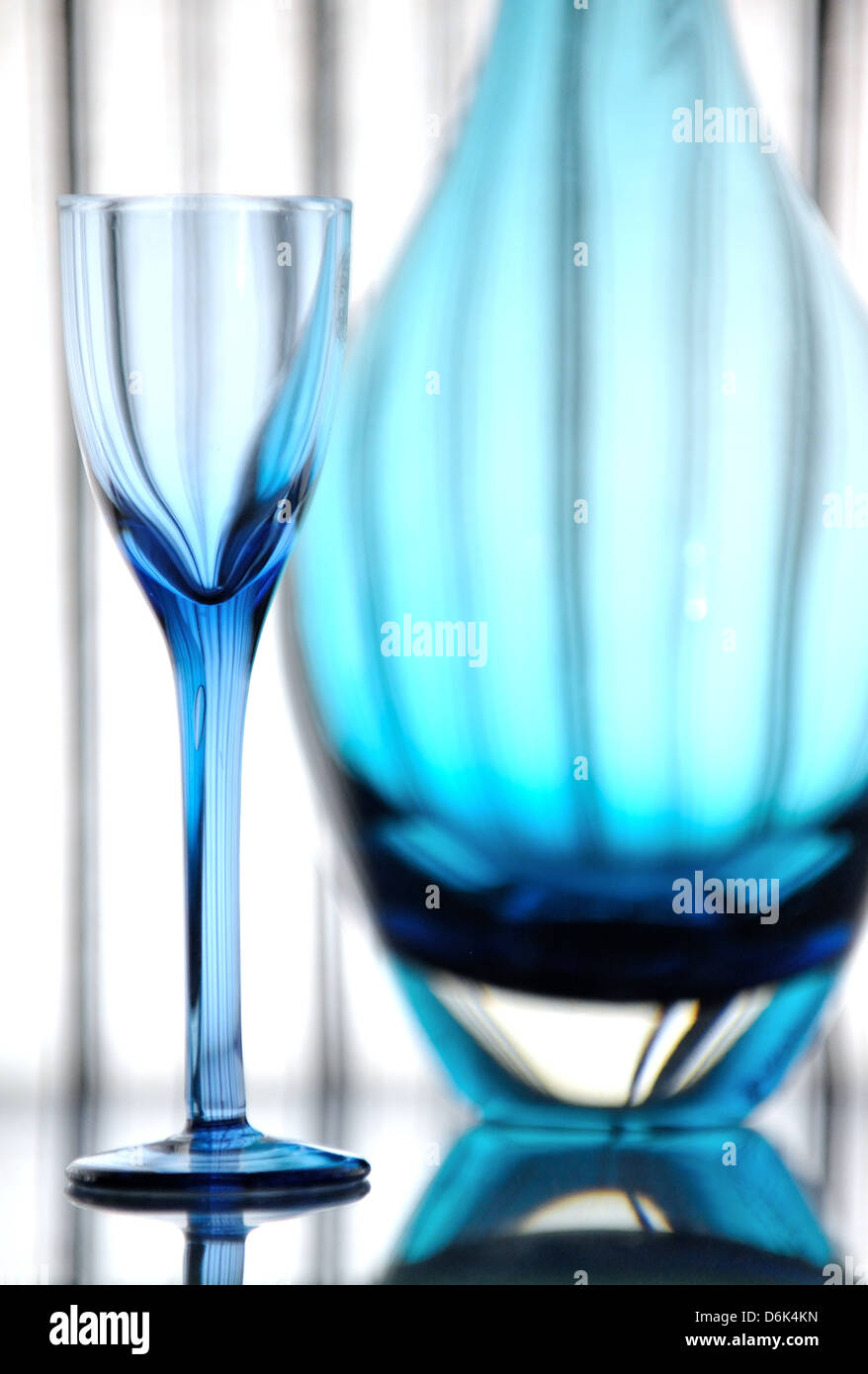 Liqueur glass and carafe Stock Photo