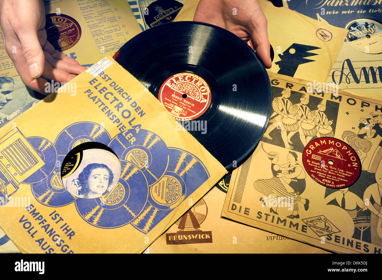 Berlin-based discjockey and gramophone records collector Stephan Wuthe presents some of his records in Leipzig, Germany, 17 March 2012. Swing music and records have experienced a renaissance and become en vogue again. Photo: Waltraud Grubitzsch Stock Photo